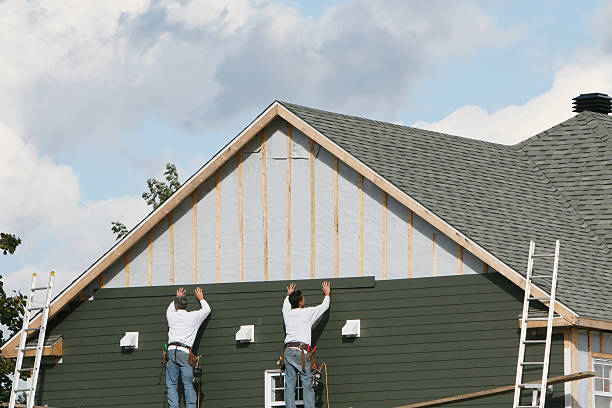 Professional Siding technician working in Bay Shore, NY